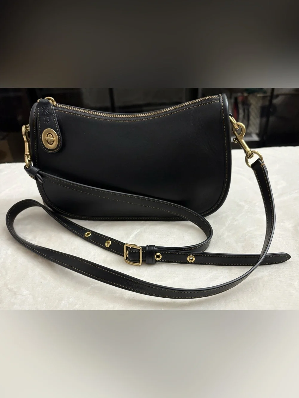 Coach Black Swinger Glove-Tanned Leather Crossbody Bag.